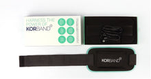 Load image into Gallery viewer, NuroKor KorBand placed next to packaging box

